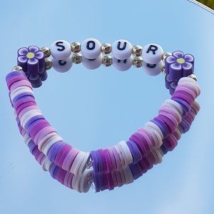 Clay bead stretchy string bracelets When you buy 2 you get 1 free bracelet!